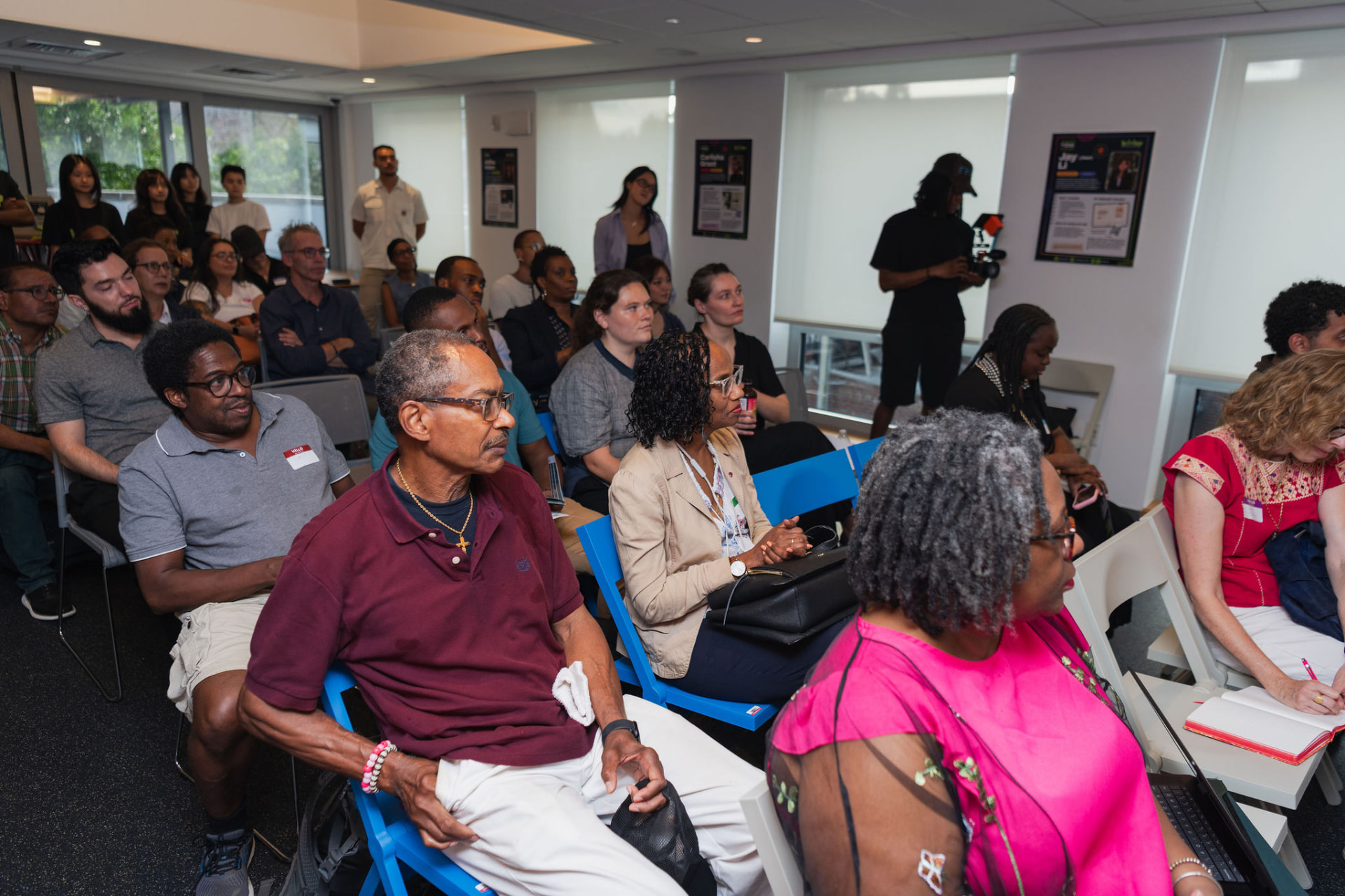 Neighbors, families and partners seated in the audience